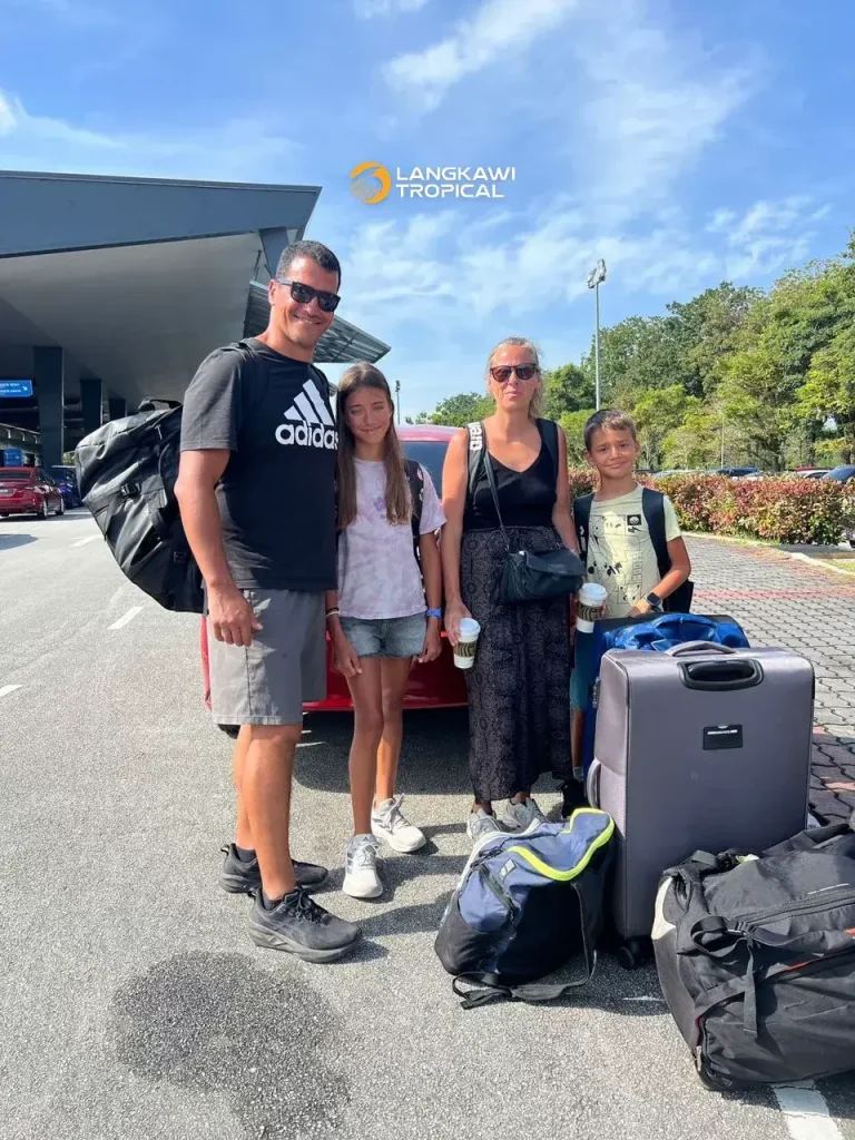 Family car rental Langkawi – happy family with their Perodua Axia